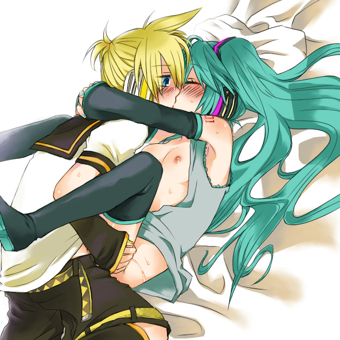 Miku’s Blushing Blue Eyed Hug: An Intimate Encounter with Kagamine Len